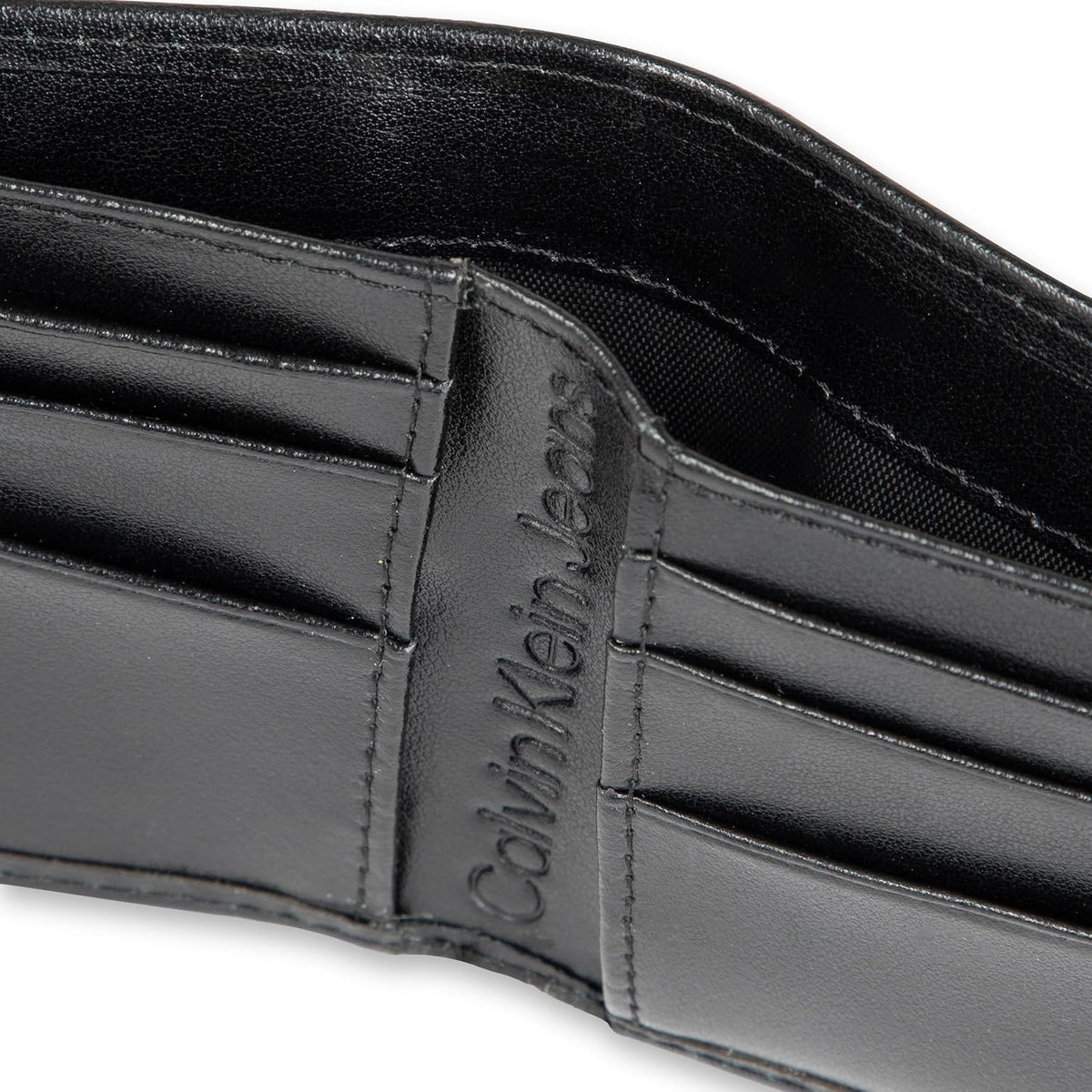 Calvin Klein Billetera plegable minimalista de cuero RFID para homb...