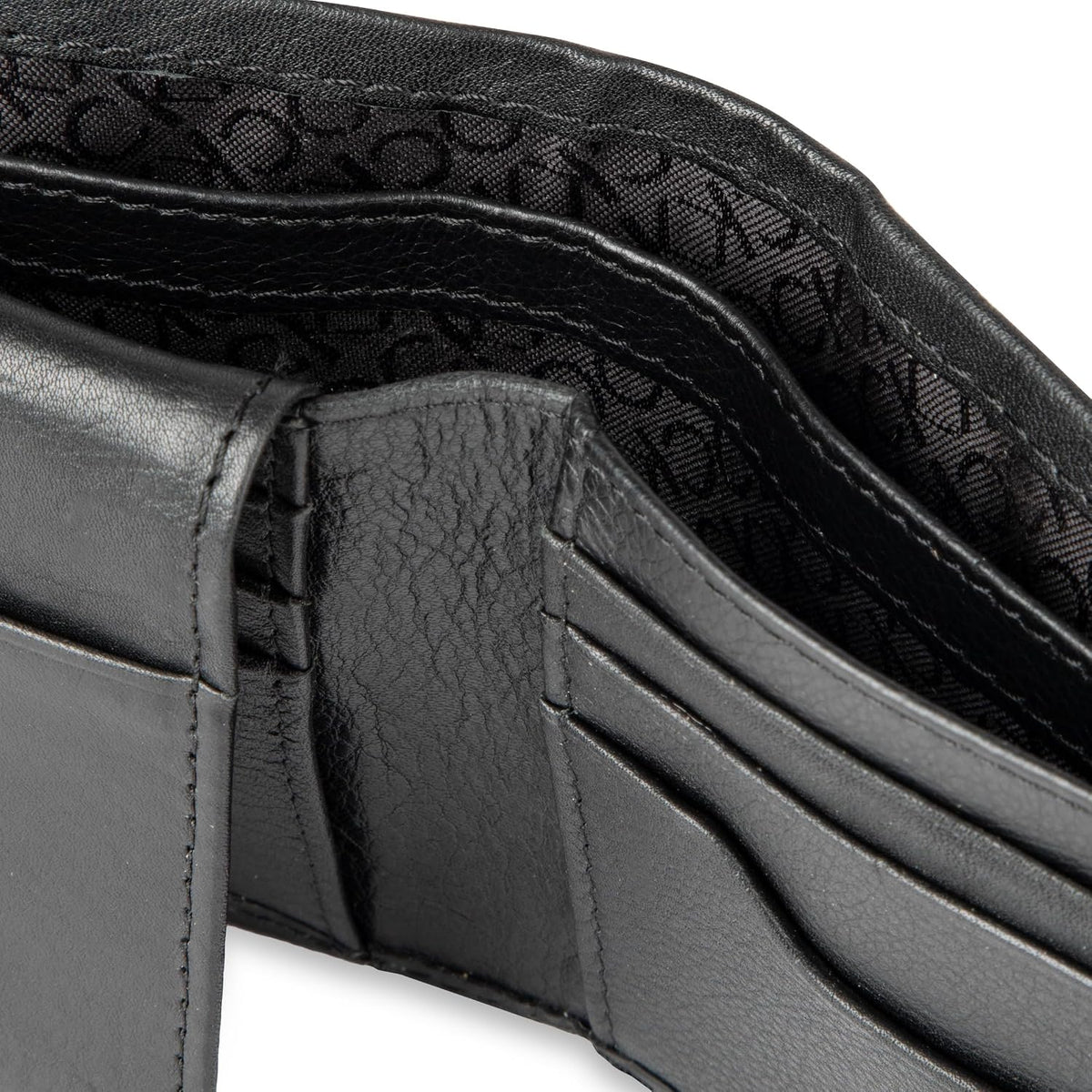 Calvin Klein Billetera plegable minimalista de cuero RFID para homb...