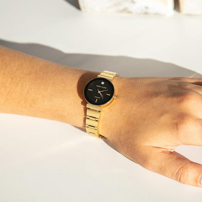 Anne Klein Reloj de pulsera con esfera de diamante genuino para mujer