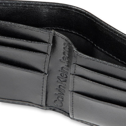 Calvin Klein Billetera plegable minimalista de cuero RFID para homb...